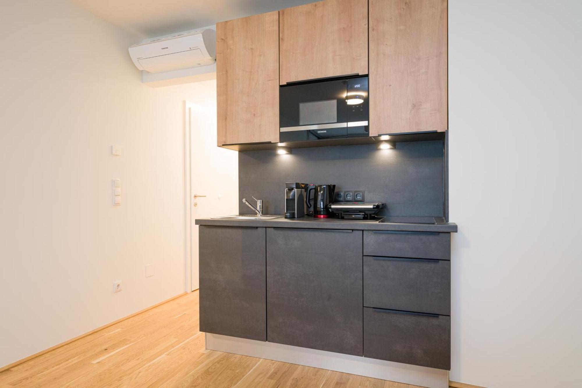 Myapartments Vienna Room photo A kitchenette in a student apartment